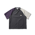 Dark grey men's quick-dry T-shirt with contrast colour raglan sleeves on a hanger.