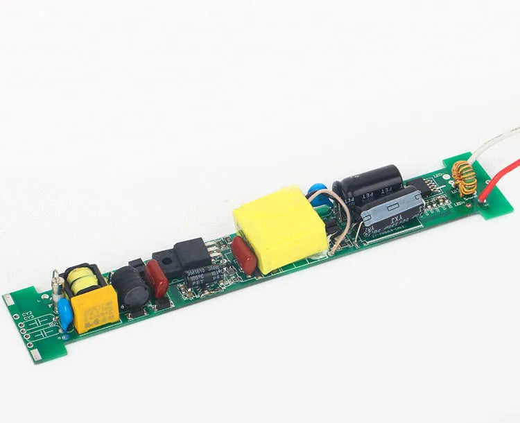 Long aluminium LED explosion-proof light strip with tempered glass cover for CNC lathe mounting.