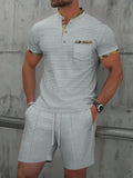 Men's grey waffle texture zipper polo collar short sleeve suit with matching shorts