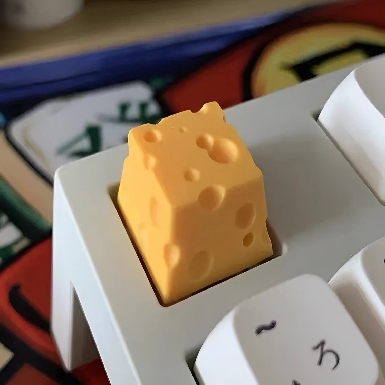 Solid yellow resin artisan key cap with detailed cheese design for MX mechanical keyboards.