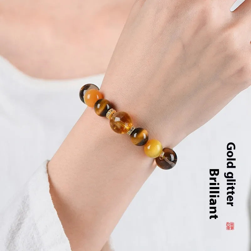 Handmade yellow crystal beaded bracelet with 10mm tower string beads on wrist