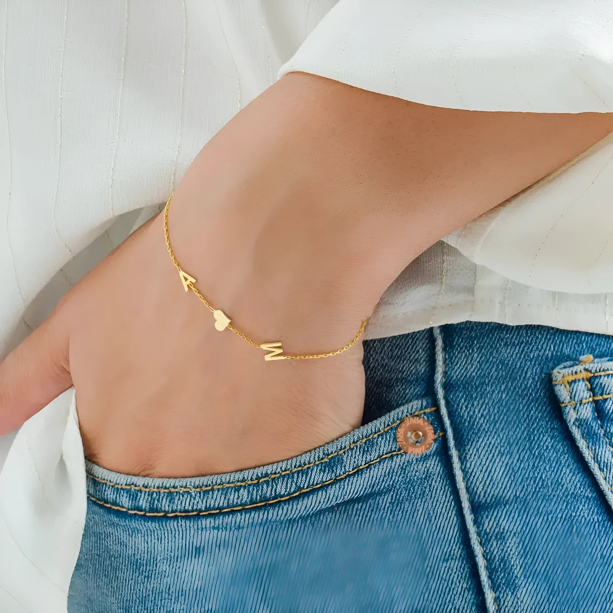 Gold stainless steel custom name bracelet with heart charm and personalised initials