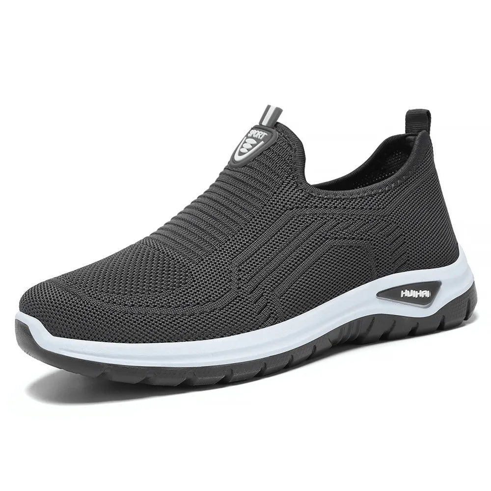 Men's black and grey breathable casual shoes with mesh lining and flat sole.