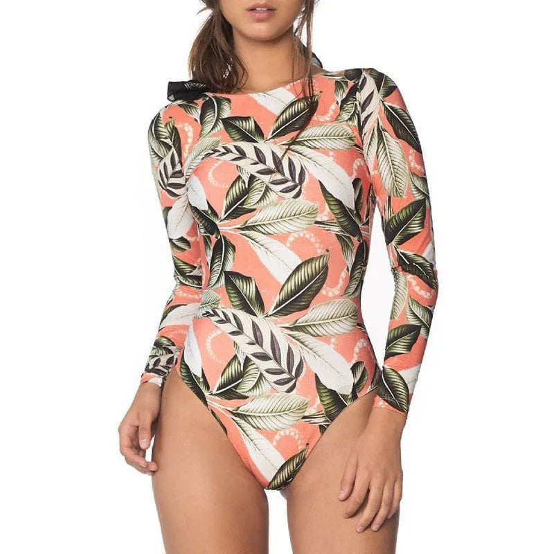 Women's leaf floral print backless one-piece swimsuit on a hanger