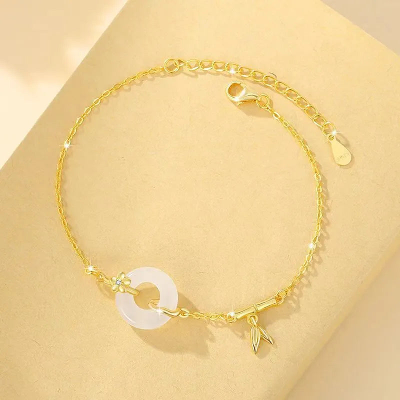 Silver gold electroplated ladies bracelet with starry sky pattern and white chalcedony stone centrepiece