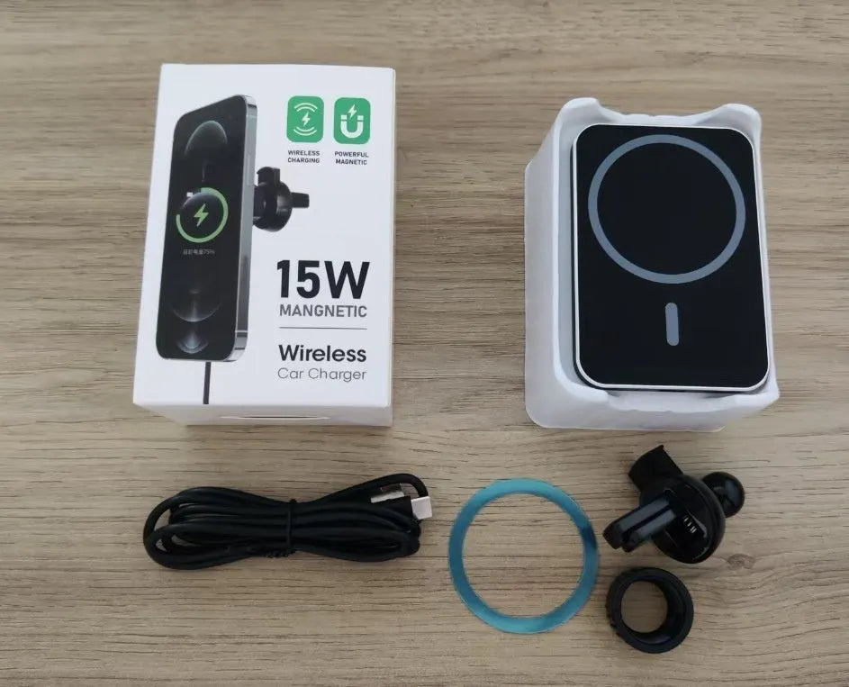 Black X-16 magnetic car wireless charger holder clipped onto car vent with phone attached