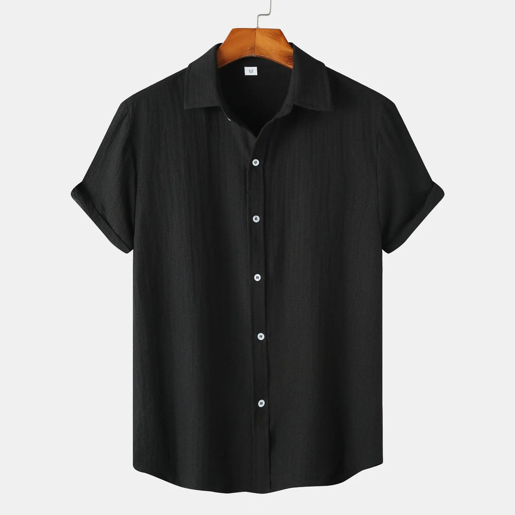 Man wearing a casual short-sleeve polyester shirt in a cardigan style, available in various colours and sizes.