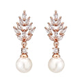 Geometric flower earrings with micro inlaid zircon stones in gold, platinum, or rose gold plating.