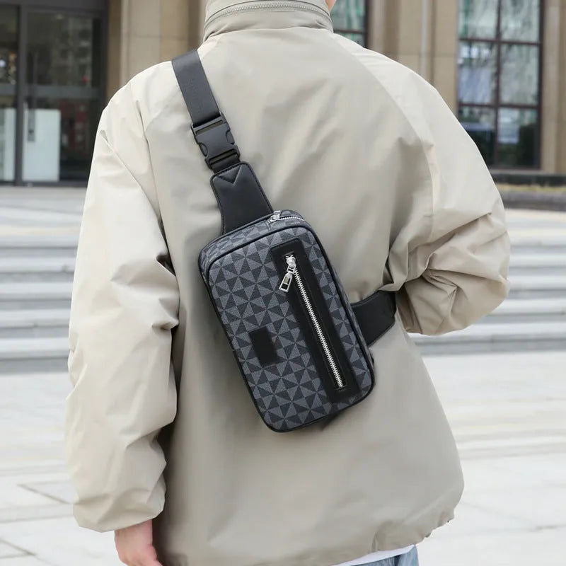 Men's black crossbody bag with chest strap and decorative sewing lines