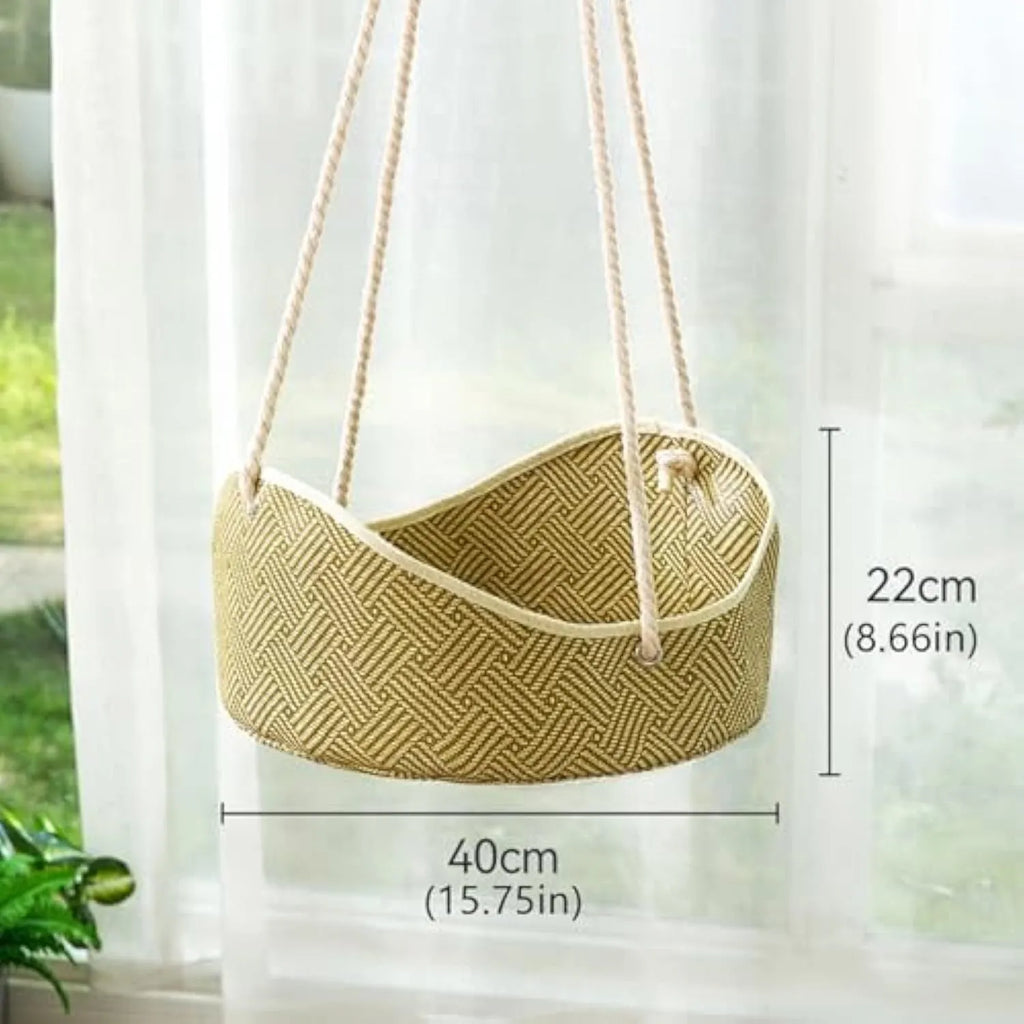 Green rattan cat hammock with metal hooks, shown hanging, suitable for small pets.