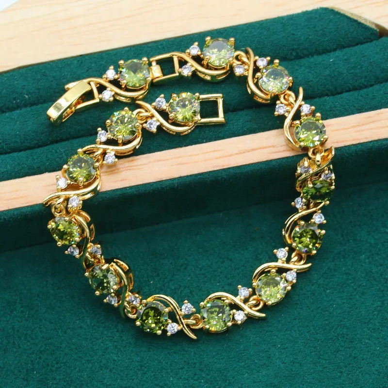 Women's copper zircon jewellery set with snake bone chain necklace, matching earrings and ring in olive green or red
