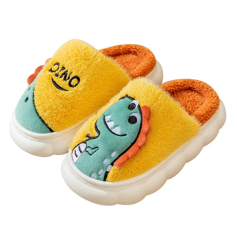 A pair of plush grey dinosaur-themed cotton slippers with a thickened sole for indoor wear.