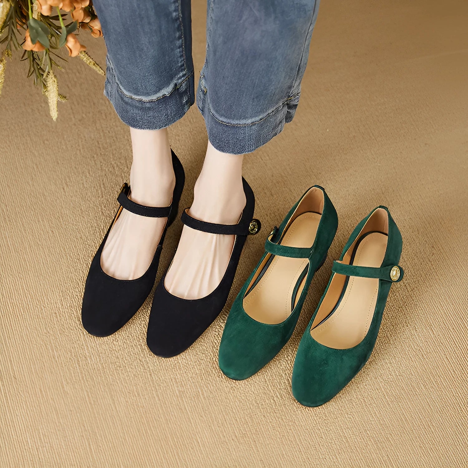 Women's black suede Mary Jane pumps with a square toe and chunky low block heel.