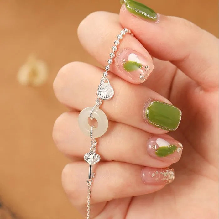 Women's 925 silver Hetian jade bracelet with Chinese geometric design and peace buckle