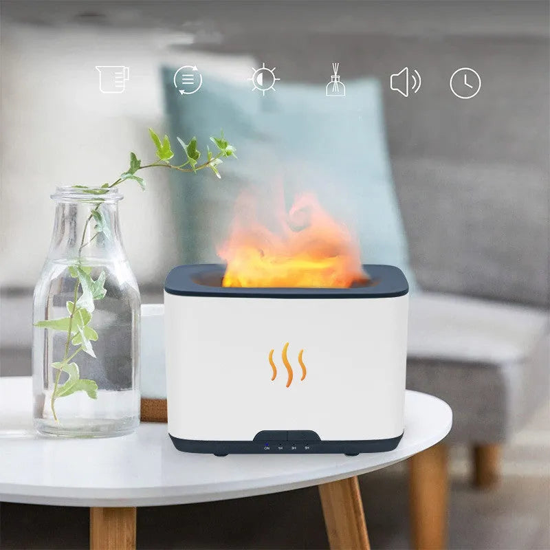 New Flame 300ml ultrasonic aromatherapy humidifier in white on a desktop with USB cable