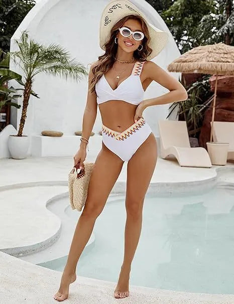 Black and white women's lace-up front swimsuit with high-waisted bikini bottoms