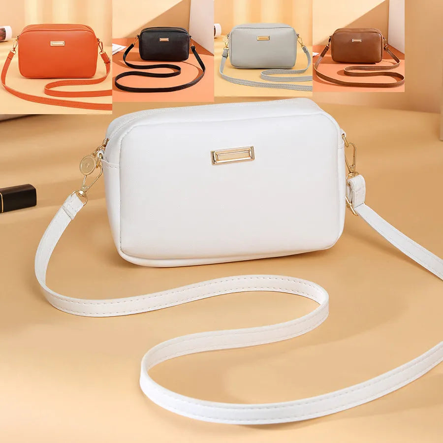 Ladies' PU shoulder bag with three-dimensional pocket in horizontal square design