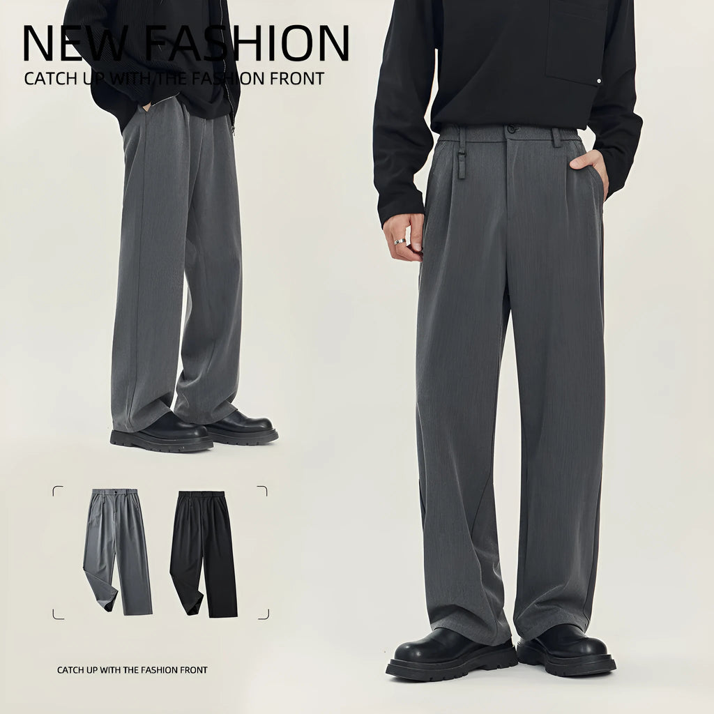 Man's black loose straight-leg business casual trousers made from a draping polyester blend fabric.
