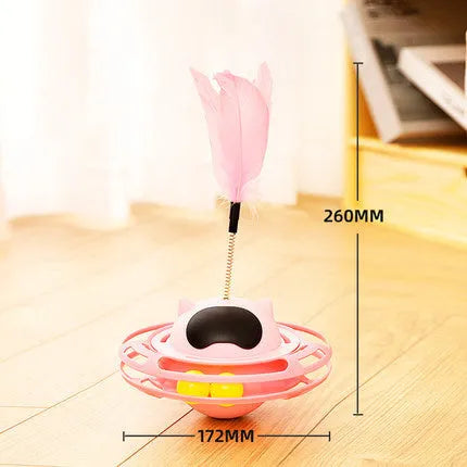Pink cat stick toy with rotating tumbler turntable measuring 17cm by 10cm