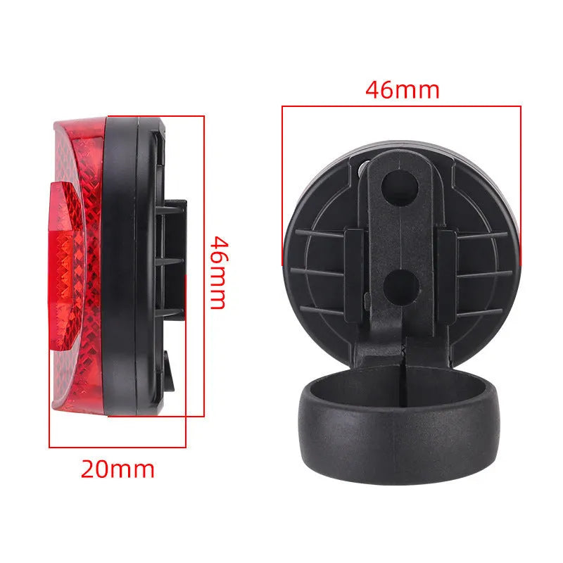 Red plastic bicycle taillight bracket mounted on seat post with reflective elements