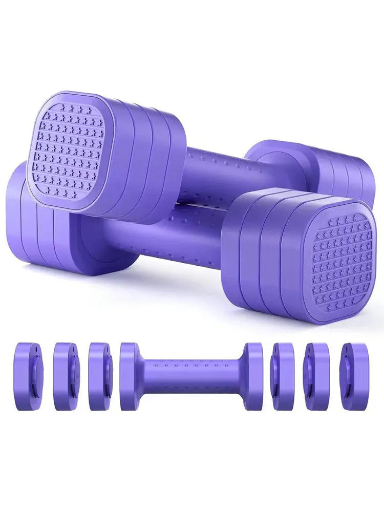 Set of pink ABS plastic dumbbells with slim-fit handles on a home gym mat.
