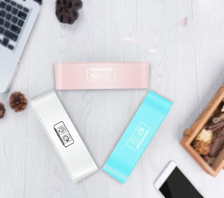 Blue rectangular LED digital alarm clock with multicoloured ambient light display.