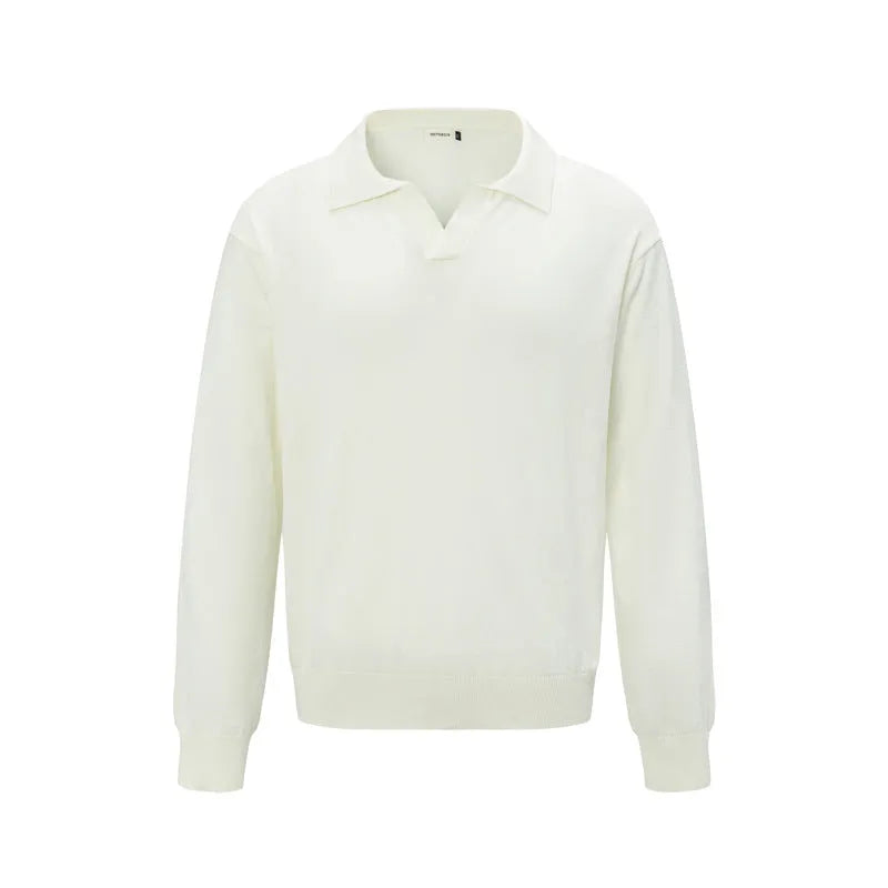 Loose fit acrylic blend pullover sweater in black, dark grey, or creamy-white.