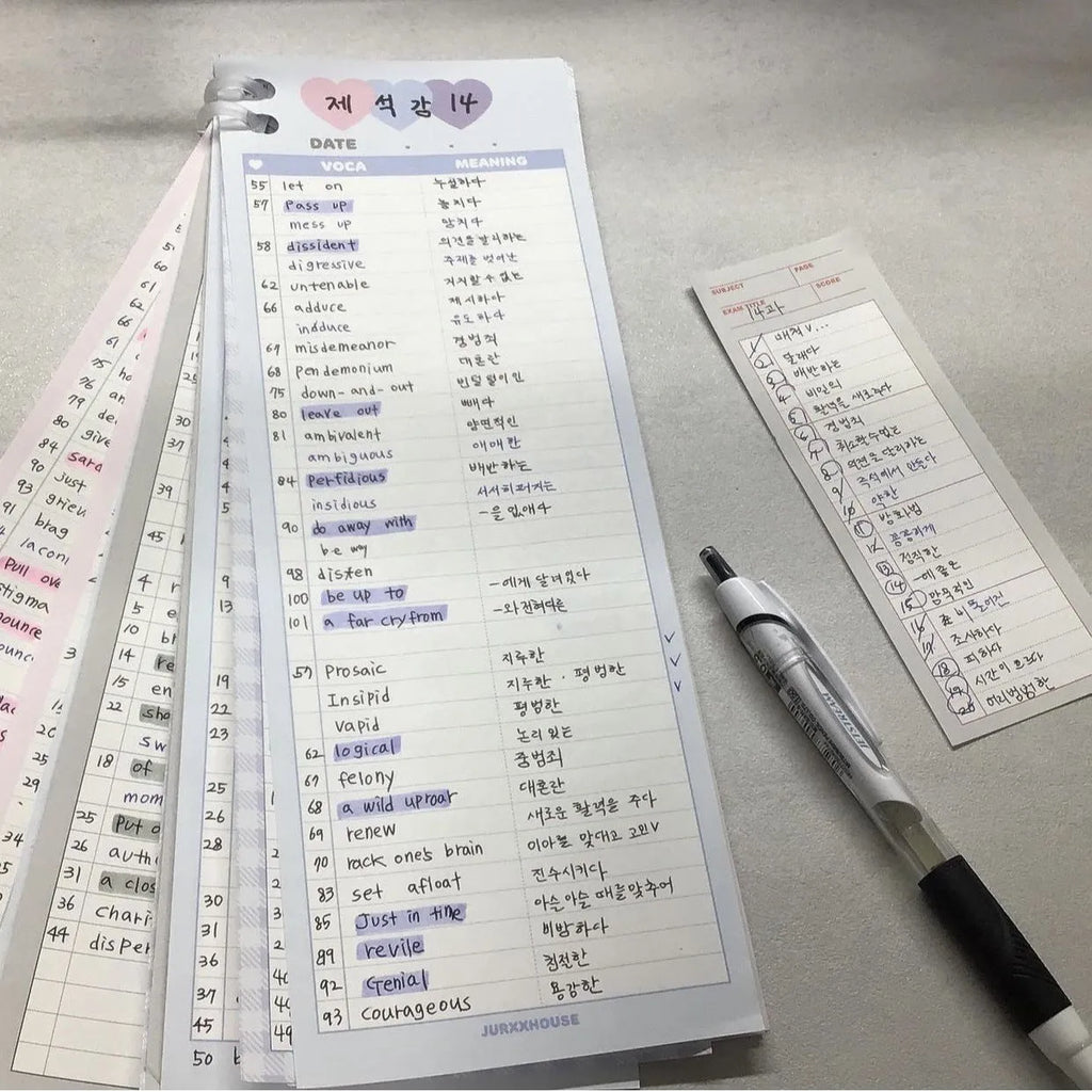 Half-B5 size notepad with English words, shown in pink, purple, and blue cover colour options.
