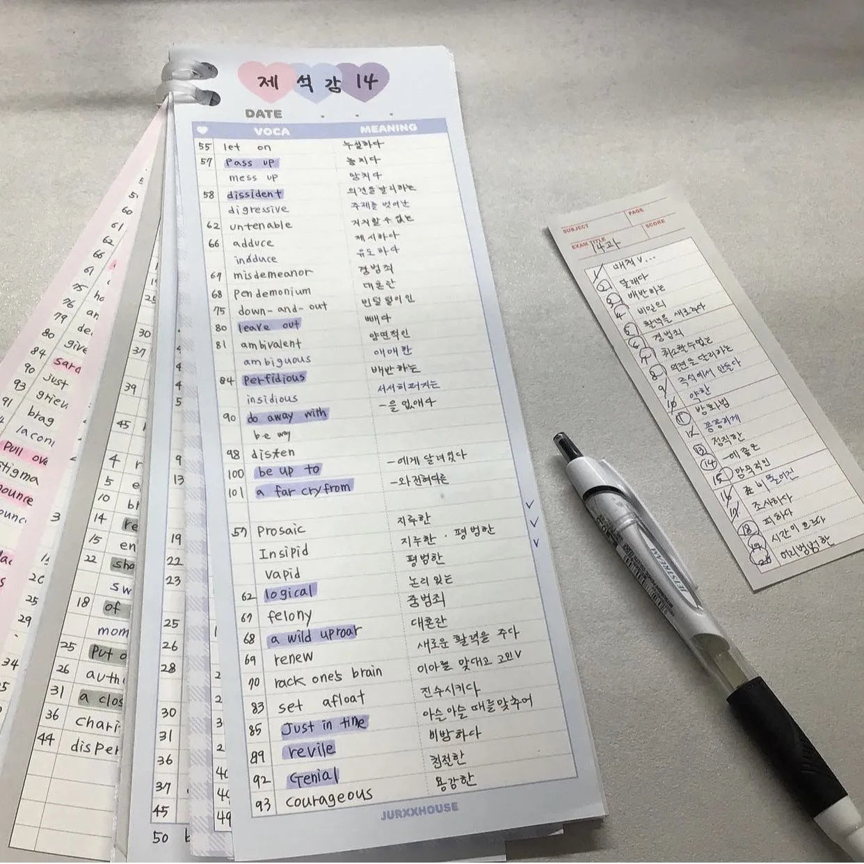 Half-B5 size notepad with English words, shown in pink, purple, and blue cover colour options.