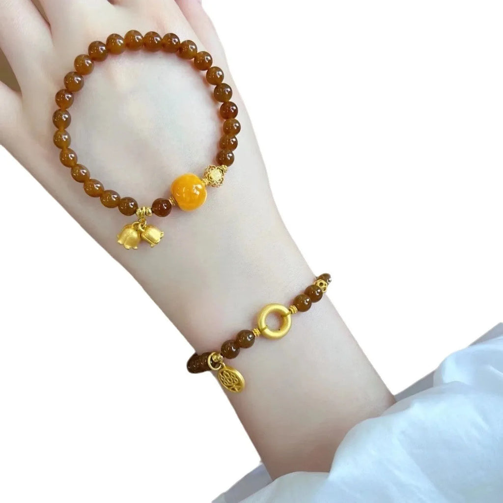 Caramel beeswax Lily bracelet with electroplated finish and floral design
