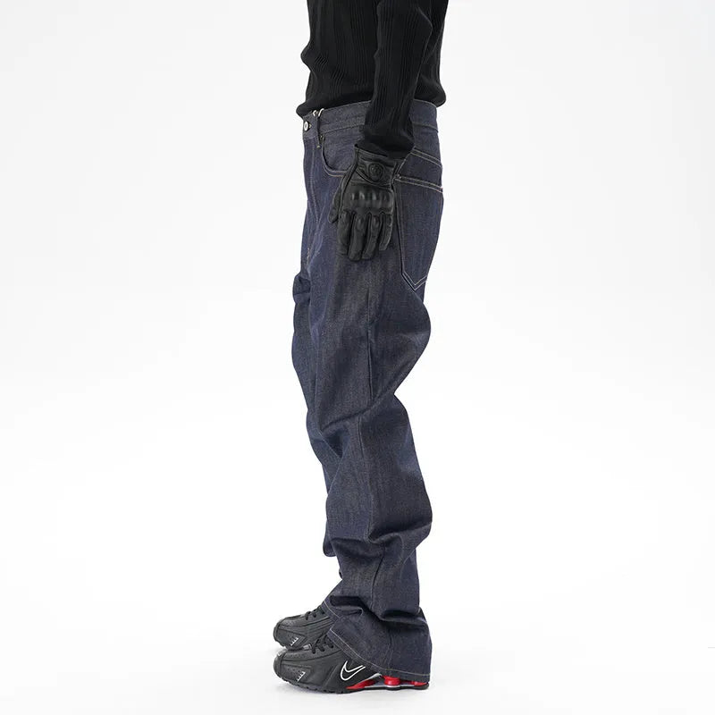 A pair of dark blue loose-fit straight leg jeans on a neutral background.