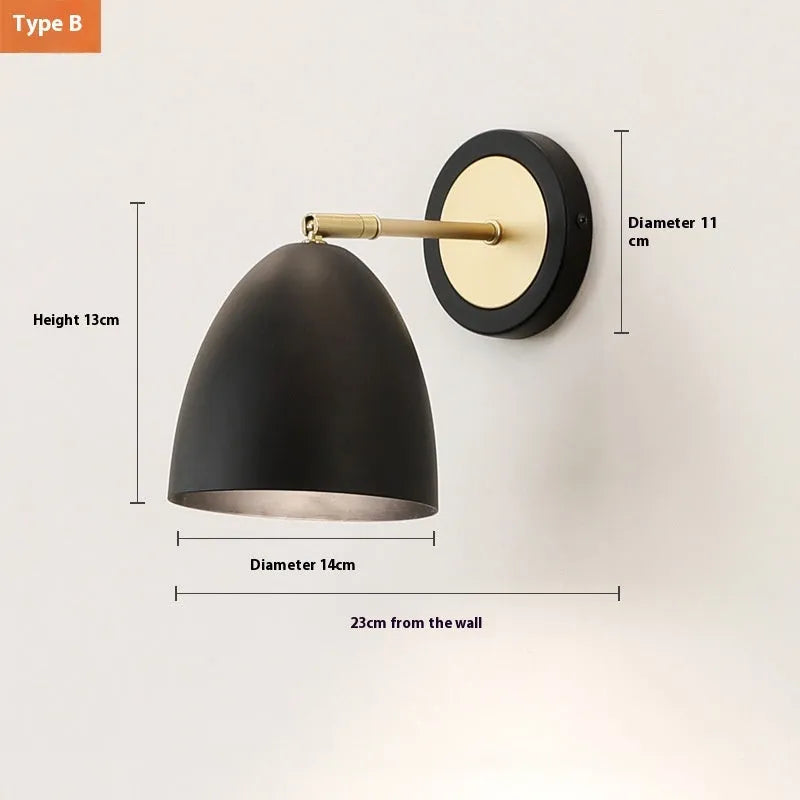 Nordic style iron wall lamp with a metallic shade for bedside or living room.