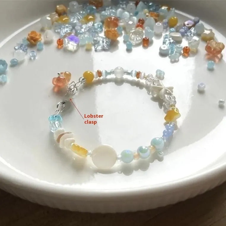 Orange water-soaked alloy bracelet with diamond shape and round elements for summer seaside styling