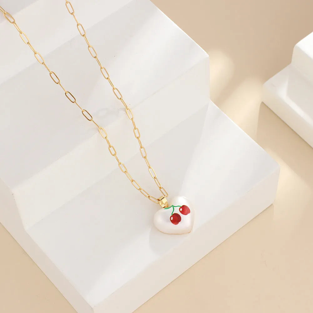 Adjustable geometric chain necklace with a choice of strawberry, pineapple, apple, pear or cherry fruit charm pendant.