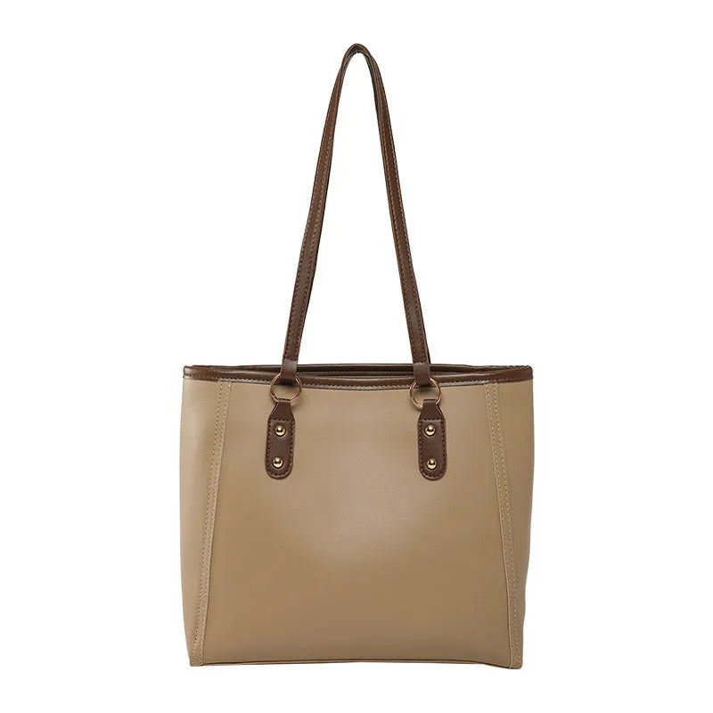 PU leather contrast colour tote bag with horizontal square shape and outer slit pocket.