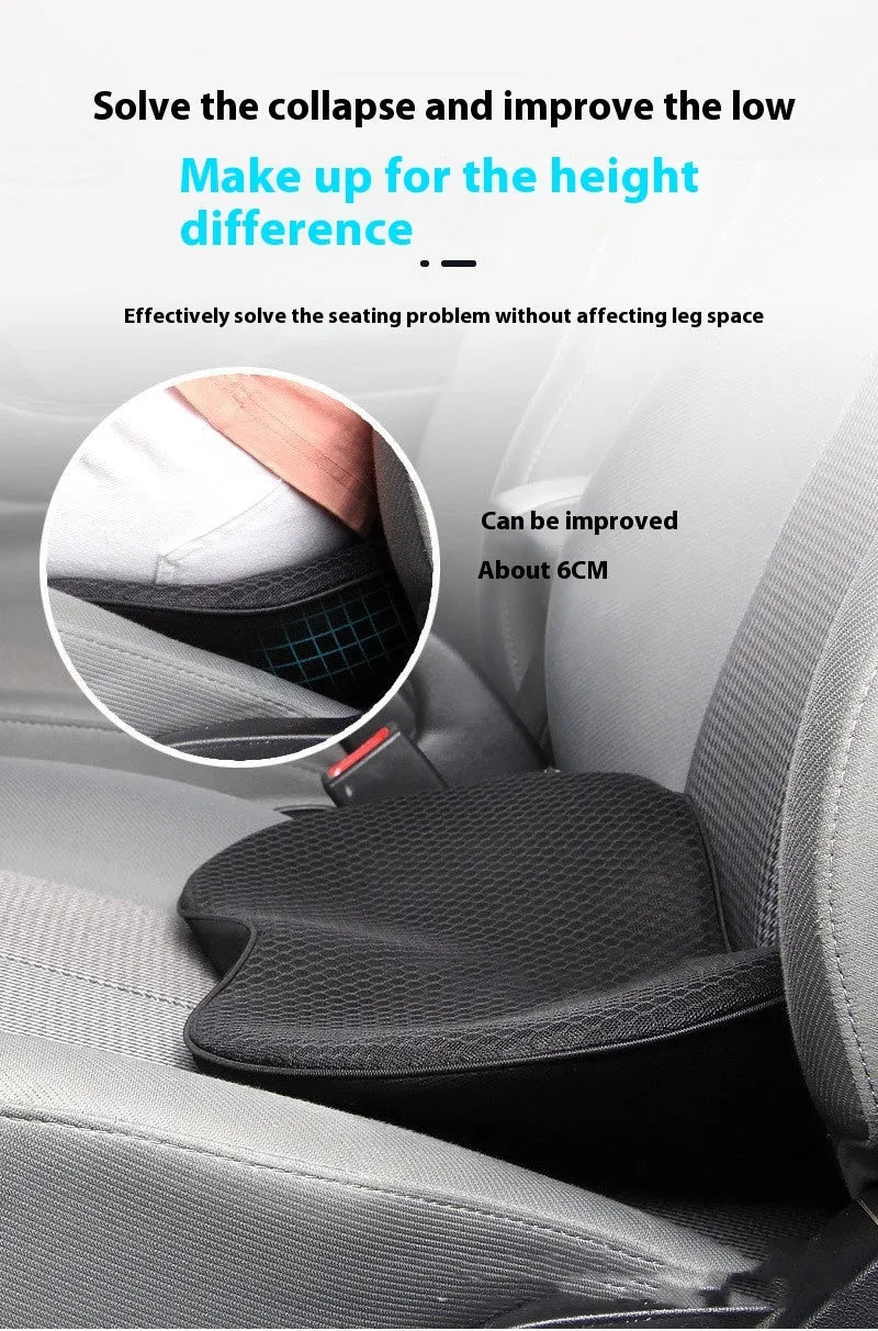Flat black memory foam car seat cushion on a grey car seat.