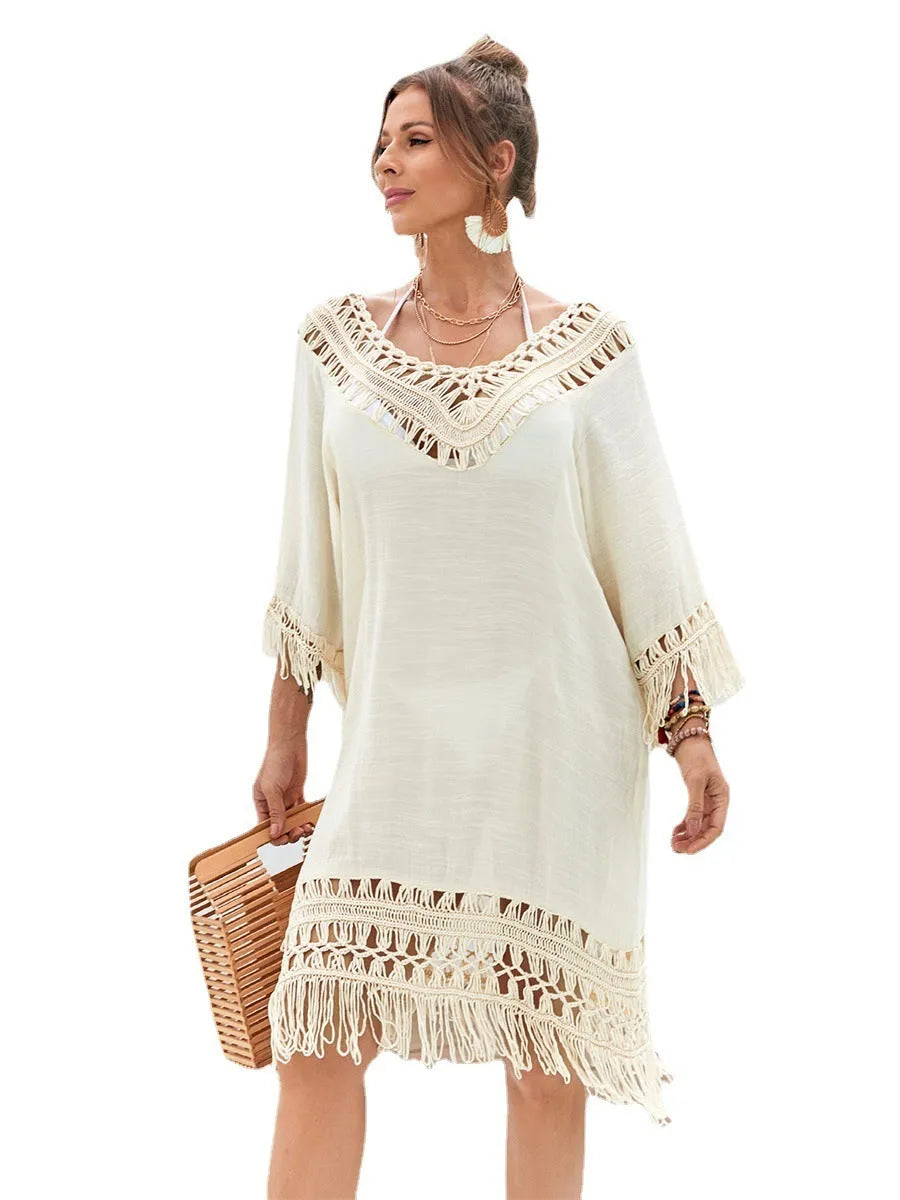 Apricot coloured hand-crocheted women's long beach dress with a solid lining.