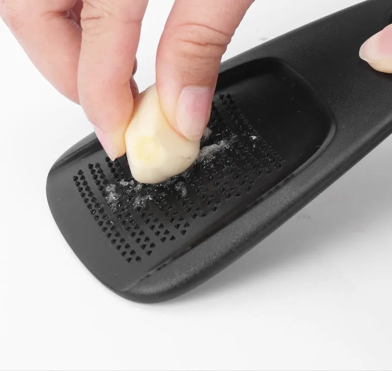 Six kitchen gadget widgets and a brush in a colour box, made from PP and stainless steel.