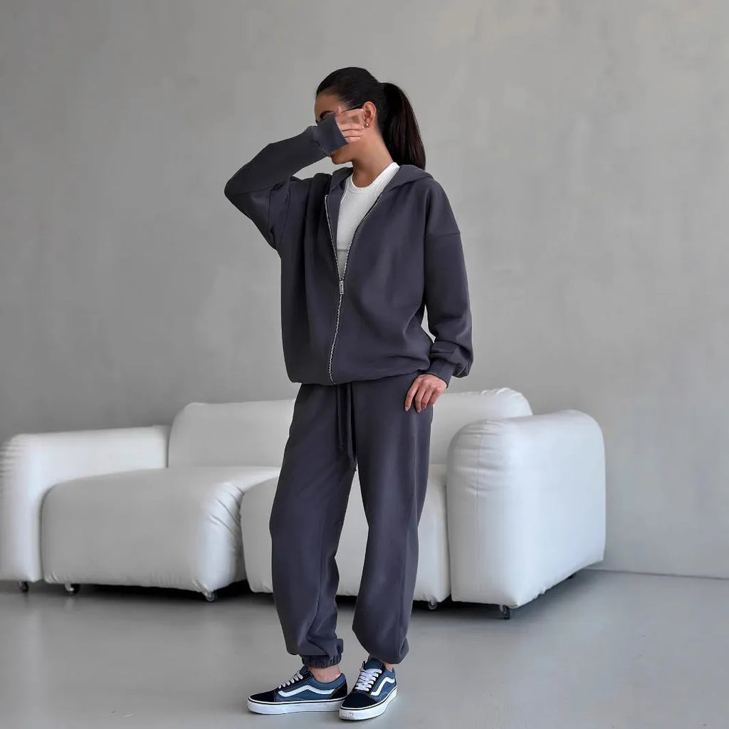 Street style loose fit two-piece set with long-sleeved coat and matching trousers in solid colour