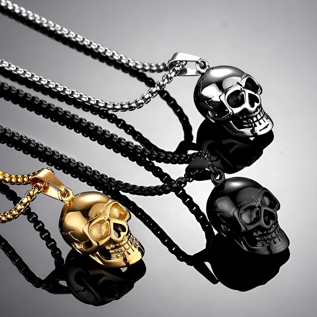 Halloween skull necklace in alloy and stainless steel with gold colour option on a black background