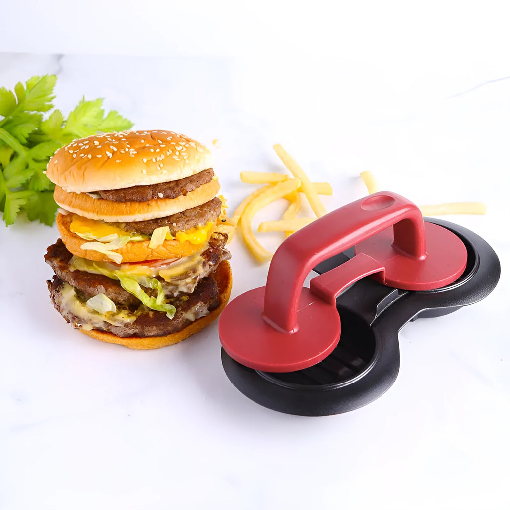 Black burger press mould on kitchen counter making hamburger patty