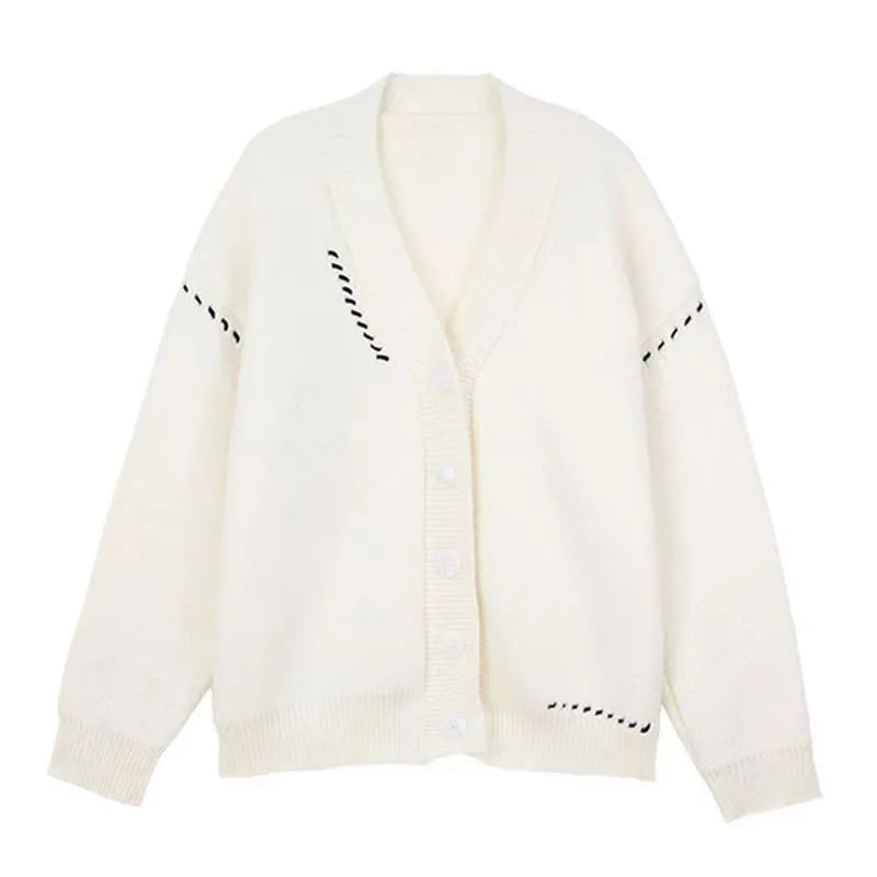 Women's loose-fit knitted cardigan top coat in black or white.