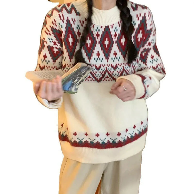 A woman wearing a loose red and white striped long-sleeved knitted pullover top.