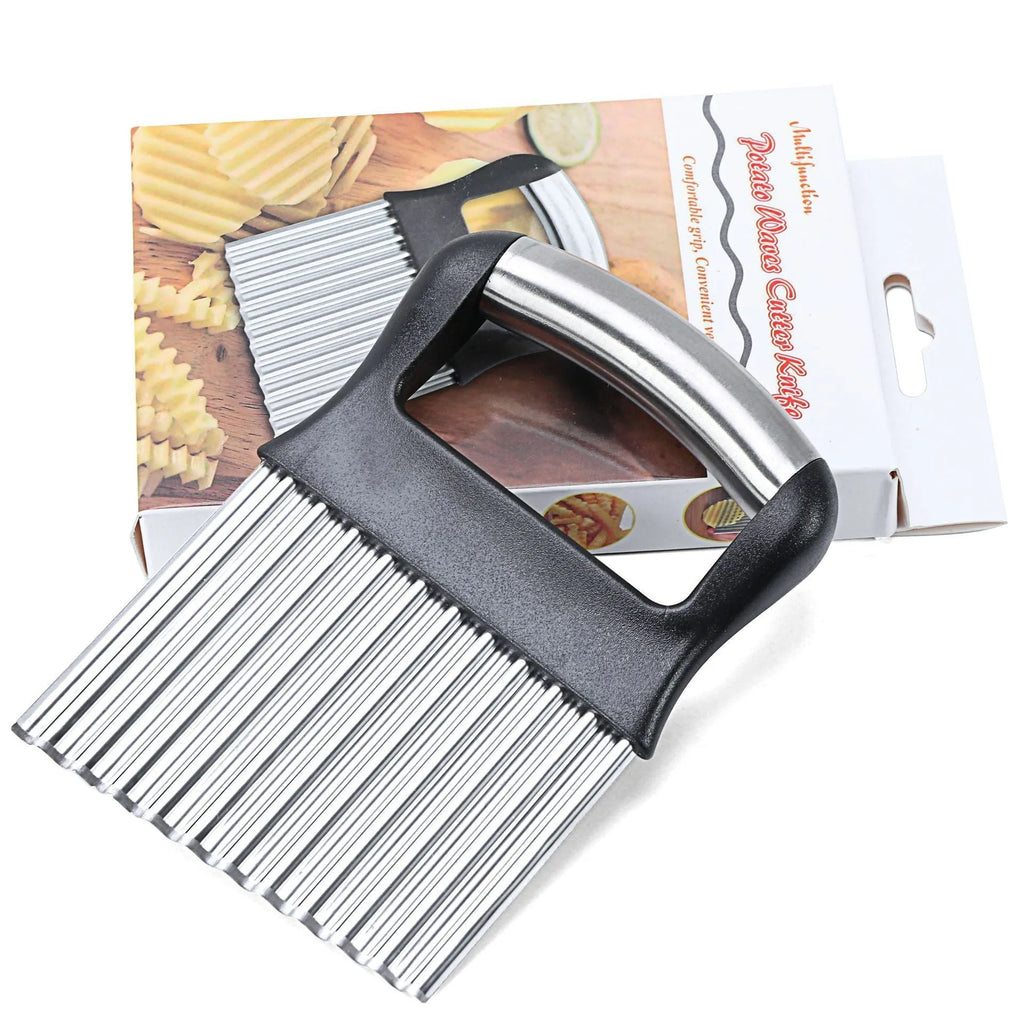 A black stainless steel potato wave knife on a kitchen counter, showing its corrugated blade.