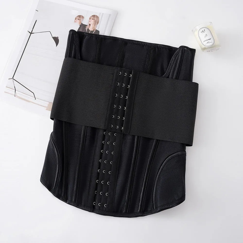 Black nylon belly band with adjustable tie shown flat, sizes XXXS to 3XL available.