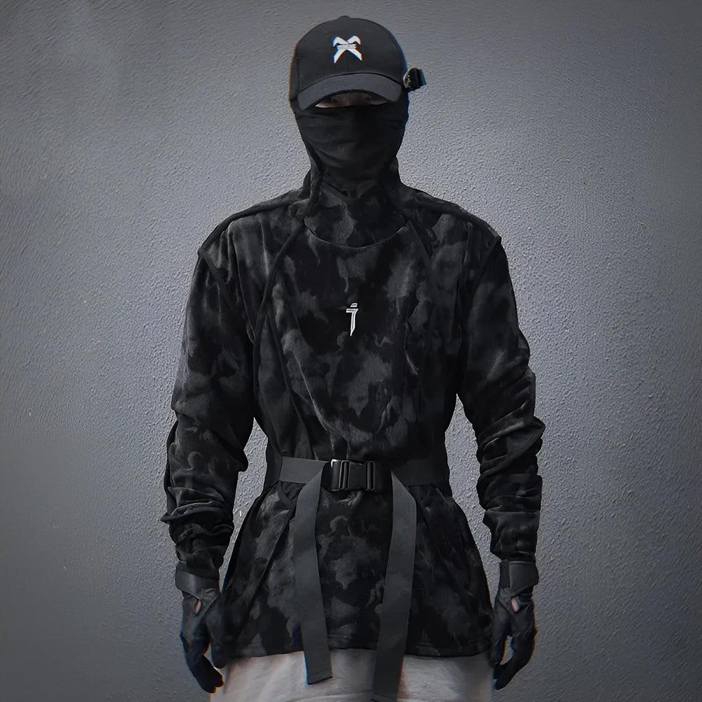 Man modelling a black and grey tie dye print loose fit pullover sweater with drop shoulders.