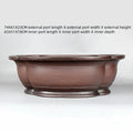 Handmade Chinese crabapple-shaped purple clay flowerpot for plants.