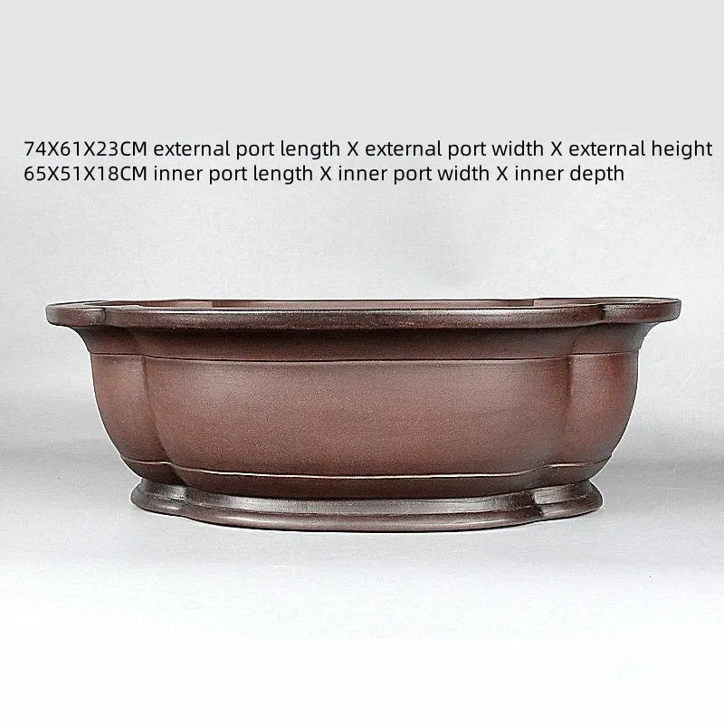 Handmade Chinese crabapple-shaped purple clay flowerpot for plants.