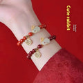 Cinnabar jade hare bracelet with purple gold sand colour beads in 6mm or 8mm size options