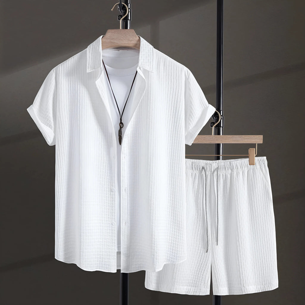 Men's black cotton blend short sleeve shirt and shorts suit set on a hanger.